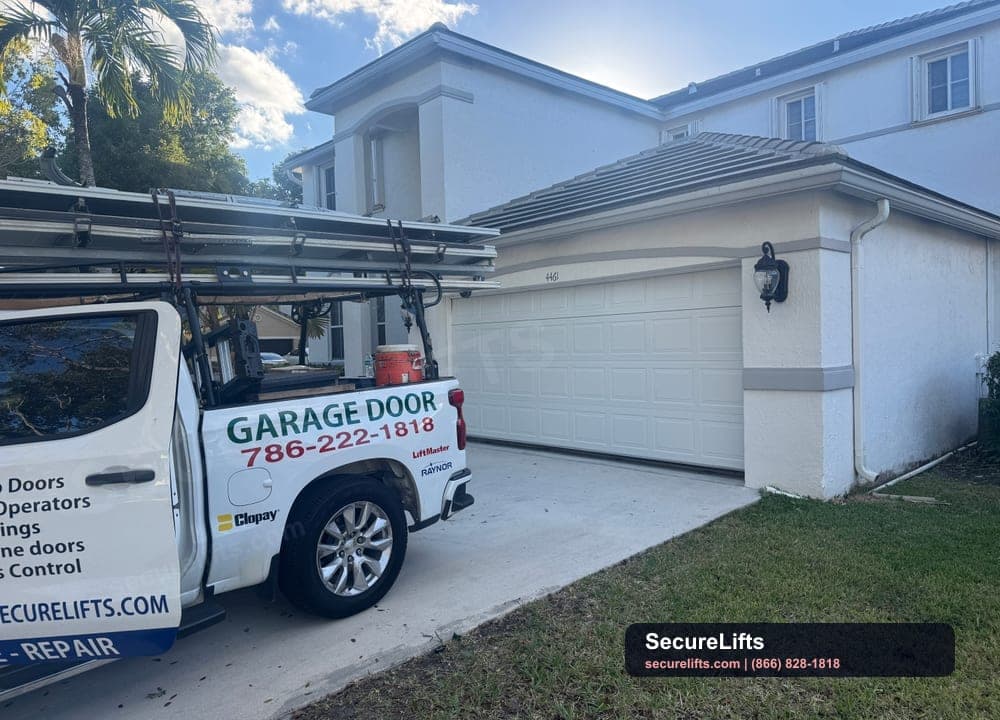 SecureLifts service vehicle at a garage door project