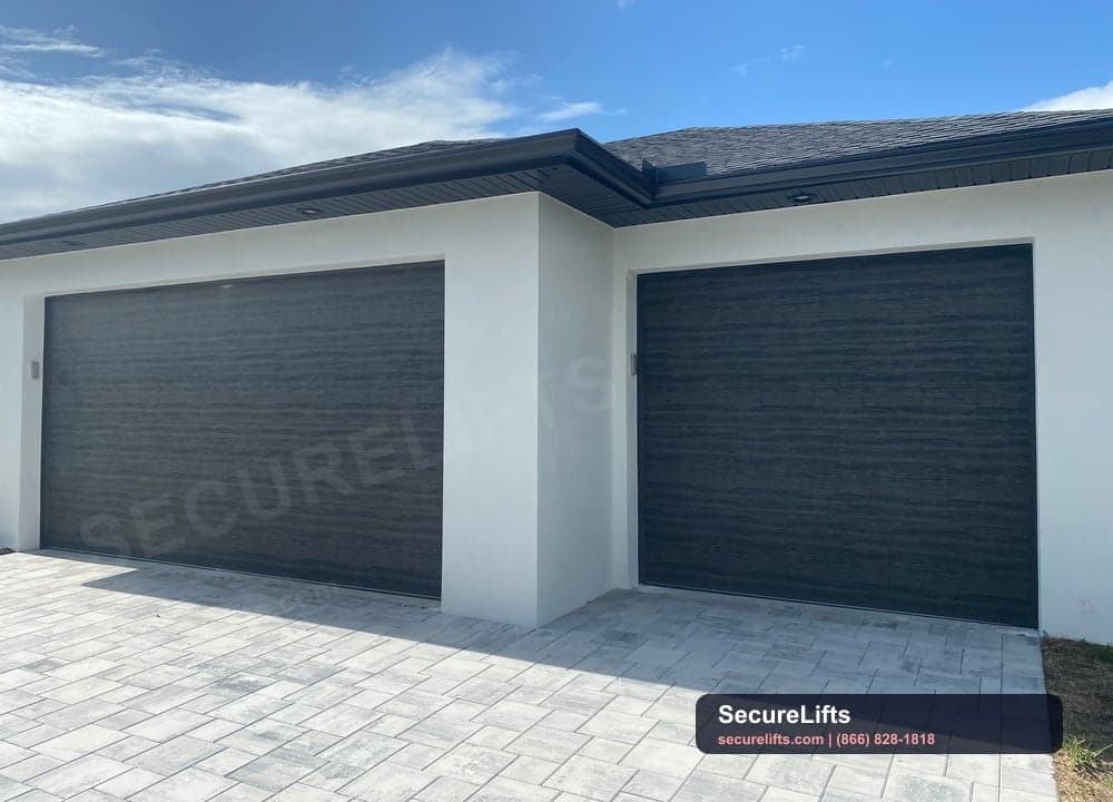 Modern black glass garage door project by SecureLifts